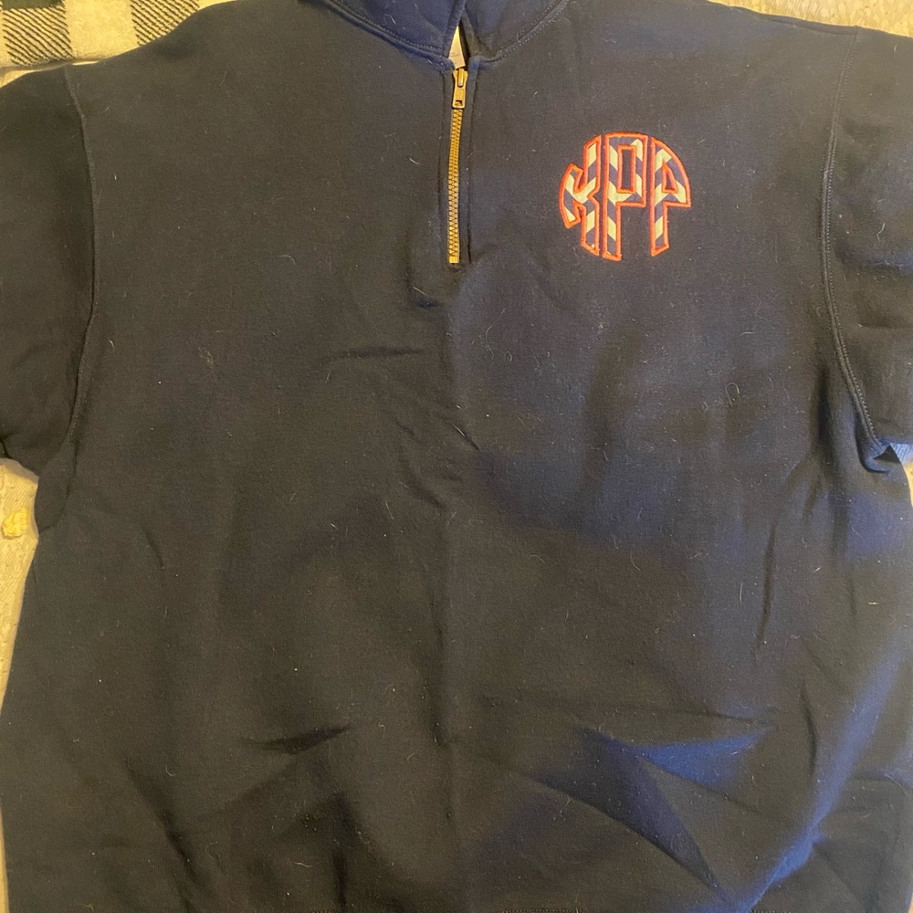 Navy blue sweatshirt w/ KPP initials